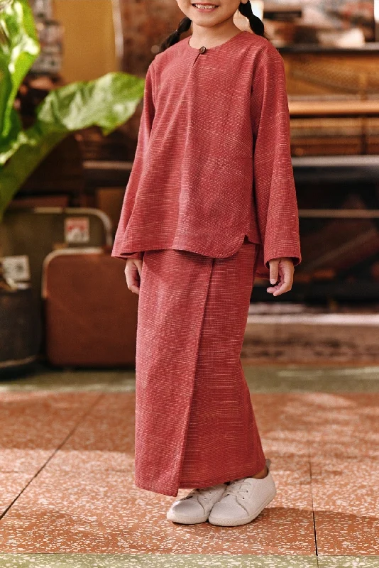 The Akar Kita Folded Skirt - Nature Scarlet leather skirt refined