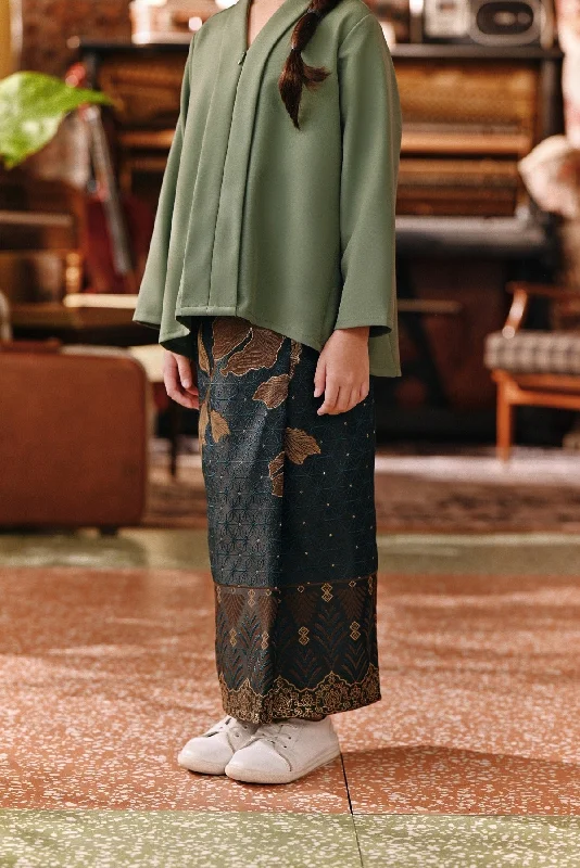 The Akar Kita Jacquard Skirt - Emerald Glow silk skirt elegant